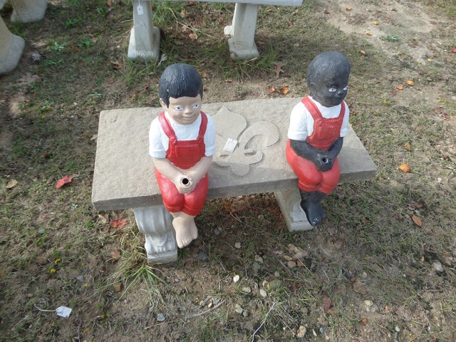 Little Boys Sitting Flag Holders
